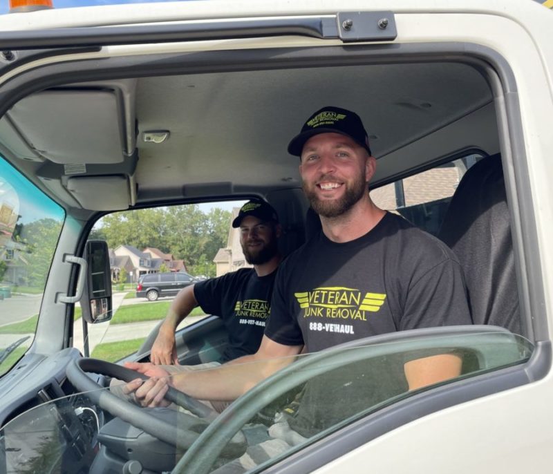 veteran junk removal crew smiling